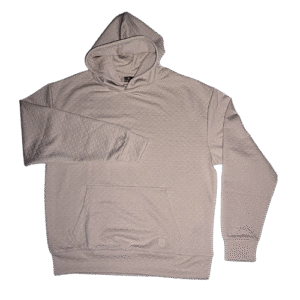 Buzo canguro Saint Studio "Stone" color beige crudo. Tejido texturizado con sutil relieve de cuadrados. Diseño minimalista con capucha y bolsillo frontal. Exclusivo de TopStore.